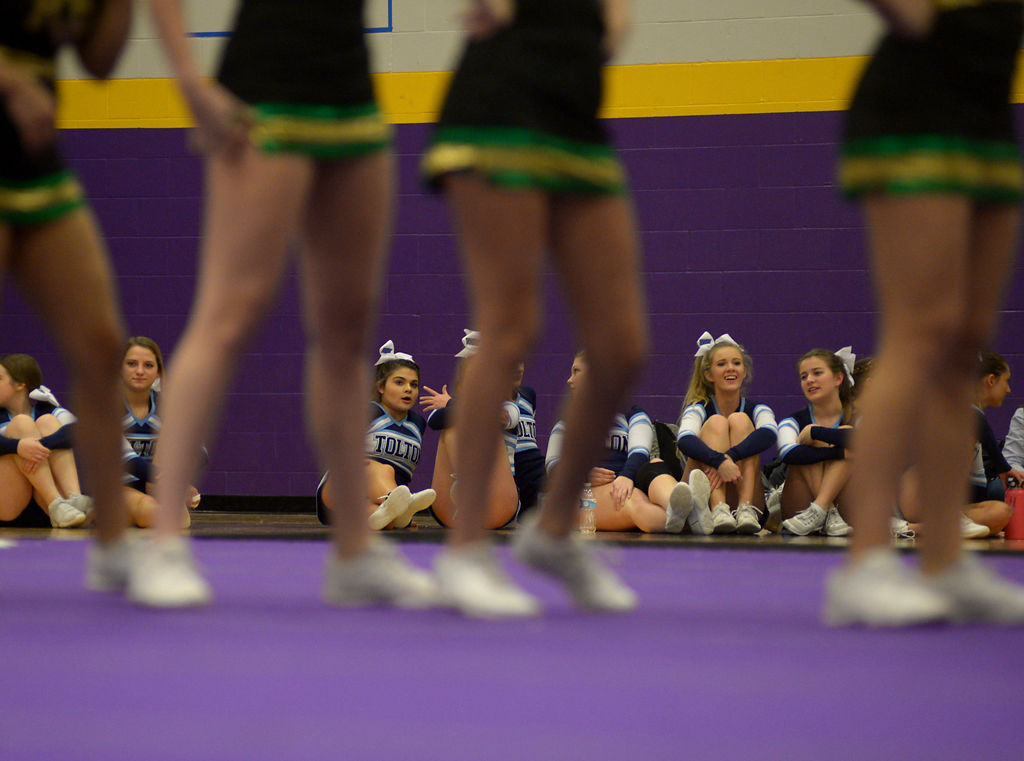 Fr. Tolton Catholic High School cheerleaders watch